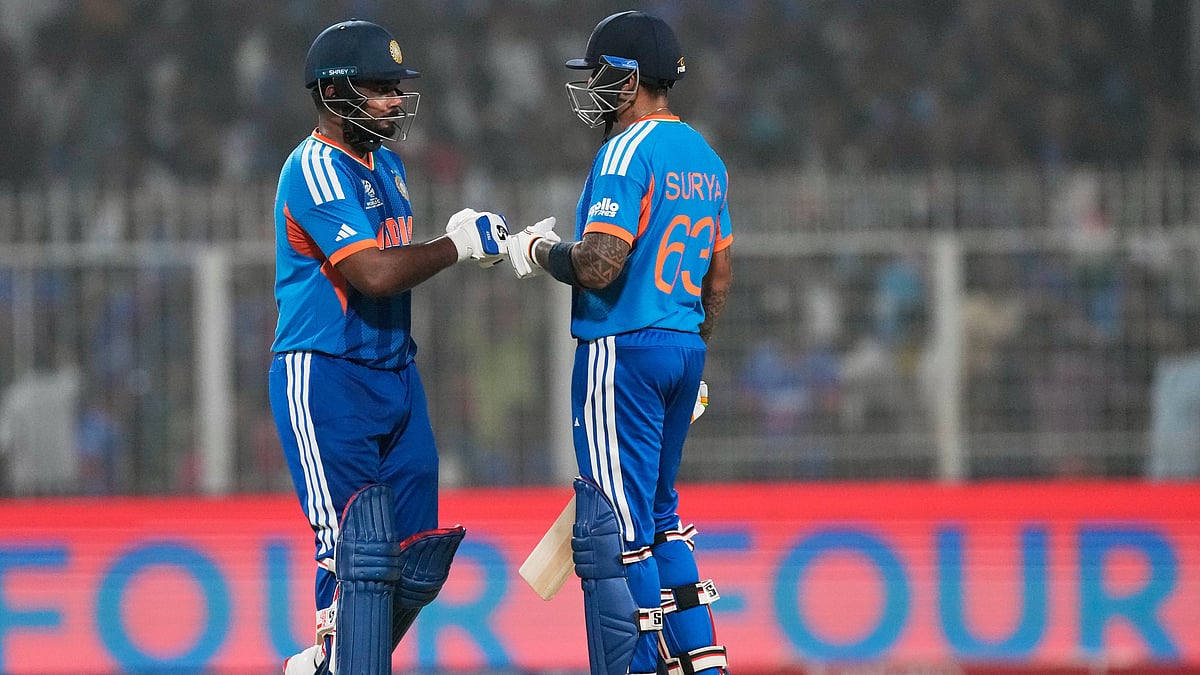 | Photo: AP/Bikas Das : Indias captain Suryakumar Yadav, right, and batting partner Sanju Samson touch gloves during the T20 World Cup cricket match between India and West Indies in Kolkata, India, Sunday, March 1, 2026.