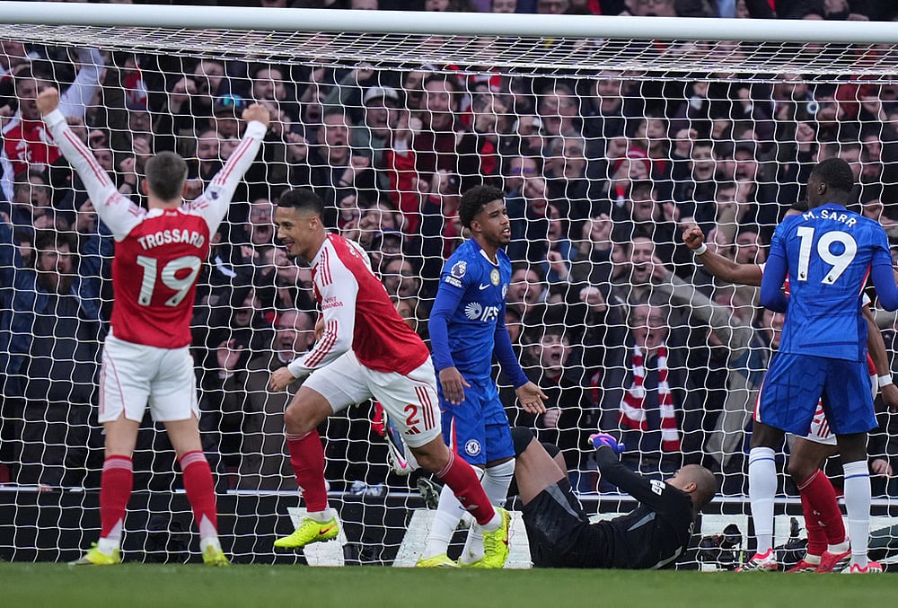 | Photo: AP/Alastair Grant : Arsenals Leandro Trossard and William Saliba celebrates after a goal during the Premier League soccer match between Chelsea Arsenal in London.