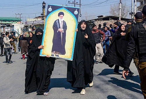 | Photo: PTI : People stage a protest over the killing of Irans Supreme Leader Ayatollah Ali Khamenei in joint air strikes by the US and Israel, amid severe restrictions on the movement of people in parts of Kashmir, Srinagar.