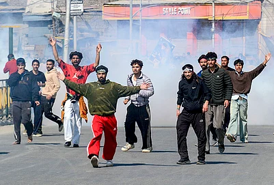 | Photo: PTI : People stage a protest against the alleged killing of Irans Supreme Leader Ayatollah Ali Khamenei in a US-Israel strike, amid severe restrictions on the movement of people in parts of Kashmir, Srinagar.