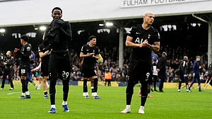 | Photo: PA/John Walton via AP : Tottenham Hotspur's Pape Matar Sarr, left, and Richarlison on the pitch after their English Premier League soccer match against Fulham in London, Sunday, March 1, 2026.