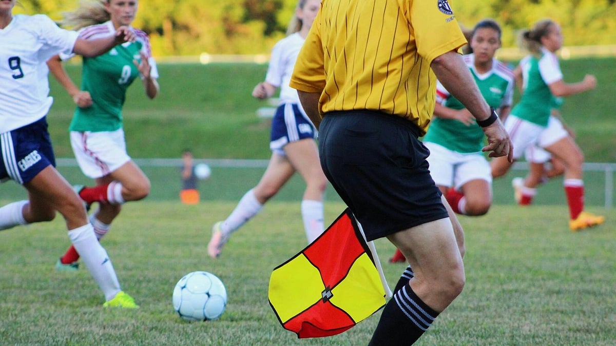 | Photo: Pexels/Noelle Otto : Representative photo of a football linesman with the offside flag.