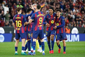 | Photo: AP/Joan Monfort : Barcelona's Robert Lewandowski (9) is congratulated after scoring his side's 4th goal during the Spanish La Liga soccer match between Barcelona and Villareal in Barcelona, Spain.