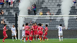 | Photo: AP/Rick Rycroft : North Korean players celebrate after their second goal during the Women's Asia Cup soccer match between North Korea and Uzbekistan in Sydney, Tuesday, March 3, 2026.