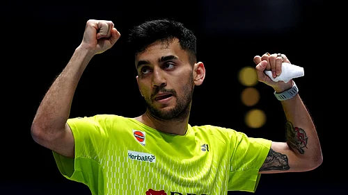 (Bradley Collyer/PA via AP) : Indias Lakshya Sen celebrates winning his mens singles match against Chinas Shi Yuqi on day one of the All England Open Badminton Championships in Birmingham, England, Tuesday, March 3, 2026.