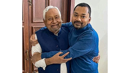 | Photo: PTI | Representative : Bihar Chief Minister Nitish Kumar with his son Nishant Kumar at his official residence, in Patna.