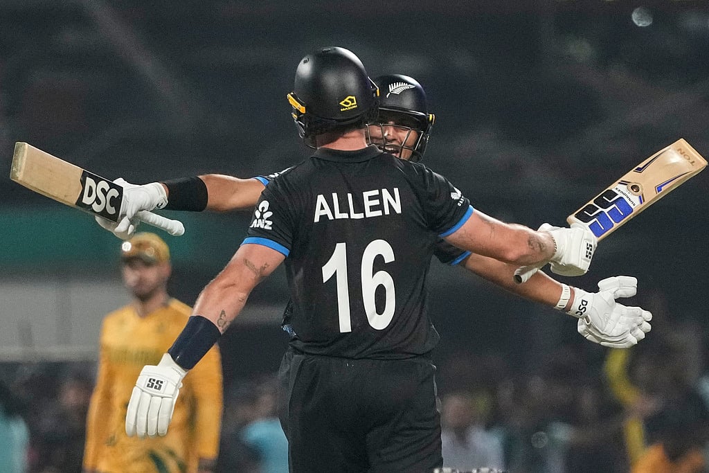 | Photo: AP/Anupam Nath : New Zealands Rachin Ravindra with his batting partner Finn Allen, celebrates after winning against South Africa during the first T20 World Cup cricket semifinal match in Kolkata.