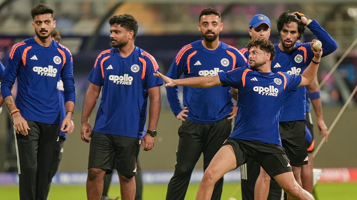 PTI : Indias Kuldeep Yadav, front, Axar Patel, left, Sanju Samson, Varun Chakravarthy and others during a training session ahead of the ICC T20 World Cup 2026 semi-final against England in Mumbai.

