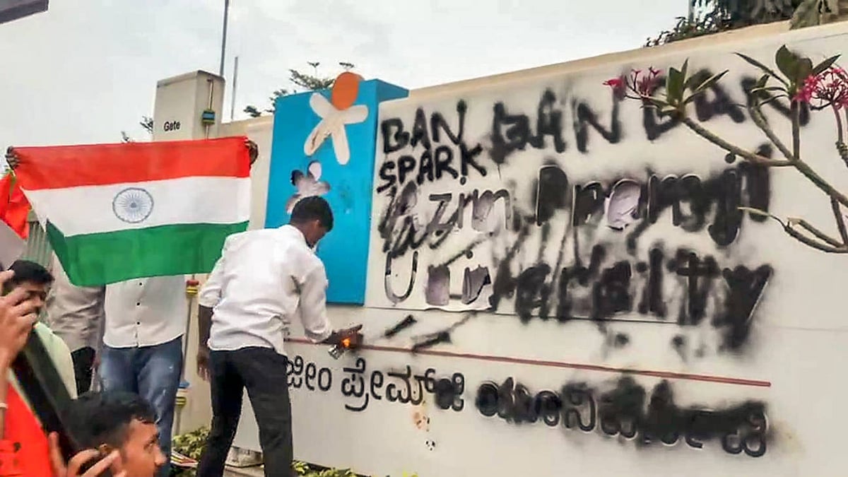 Students affiliated with ABVP stage a protest alleging an anti-Army programme at Azim Premji University Anekal Karnataka , Feb 25 (ANI): Students affiliated with ABVP smeared black ink on the University s billboard during a protest alleging an anti-Army programme at Azim Premji University, in Anekal on Tuesday.