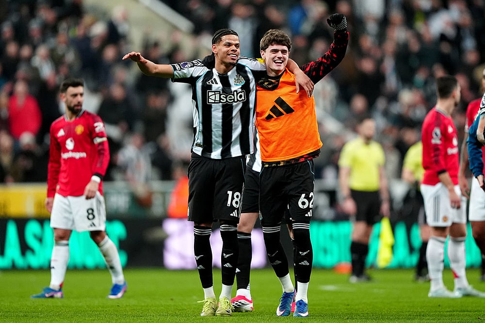 | Photo: Owen Humphreys/PA via AP : Newcastle Uniteds William Osula, left, and Sean Neave celebrate after the English Premier League soccer match against Manchester United in Newcastle, England.