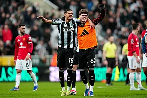 | Photo: Owen Humphreys/PA via AP : Newcastle United's William Osula, left, and Sean Neave celebrate after the English Premier League soccer match against Manchester United in Newcastle, England.