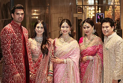 | Photo: PTI : From right, Cricketer Sachin Tendulkar, with wife Anjali Tendulkar, daughter Sara Tendulkar during his sons Arjun Tendulkar and industrialist Ravi Ghai’s granddaughter Saaniya Chandhok wedding ceremony, in Mumbai.