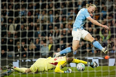 | Photo: AP/Dave Thompson : Nottingham Forests goalkeeper Matz Sels saves at the feet of Manchester Citys Erling Haaland during the English Premier League soccer match between Manchester City and Nottingham Forest in Manchester, England.