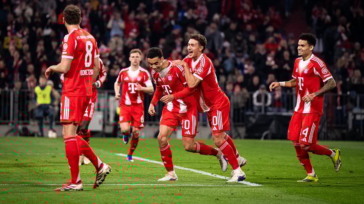 Bayern Munich's Jamal Musiala celebrates his first Bundesliga goal of the season