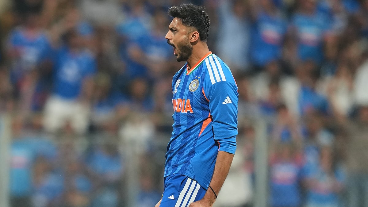 | Photo: AP/Rafiq Maqbool : Indias Axar Patel celebrates the dismissal of Englands Tom Banton during the T20 World Cup cricket semi-final match between India and England in Mumbai, India, Thursday, March 5, 2026. 