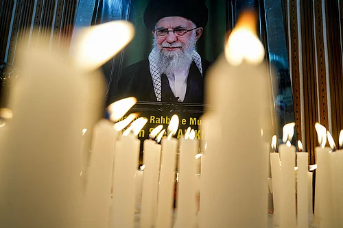 | Photo: PTI/Karma Bhutia : Candles lit during a condolence meeting for Irans Supreme Leader Ayatollah Ali Khamenei who was killed in US-Israel joint strikes, in New Delhi.