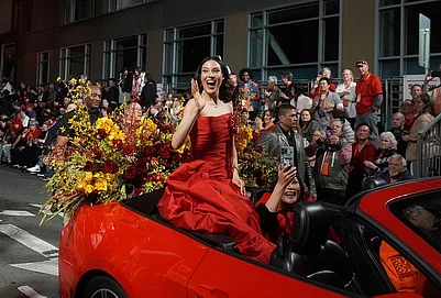 | Photo: AP/Jeff Chiu : Olympic gold medalist and Grand Marhsal Eileen Gu waves during the Chinese New Year Parade in San Francisco.
