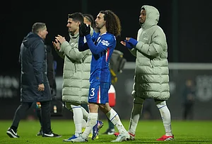 | Photo: AP/Jon Super : Chelsea players walk off the pitch after the fifth round FA Cup soccer match between Wrexham and Chelsea in Wrexham, Wales.