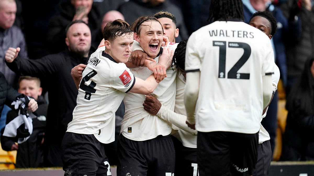 | Photo: AP/Nick Potts : Port Vale's Ben Waine celebrates with teammates after scoring his side's first goal of the game, during the FA Cup fifth round soccer match between Sunderland and Port Vale, in Stoke on Trent, England, Sunday March 8, 2026.