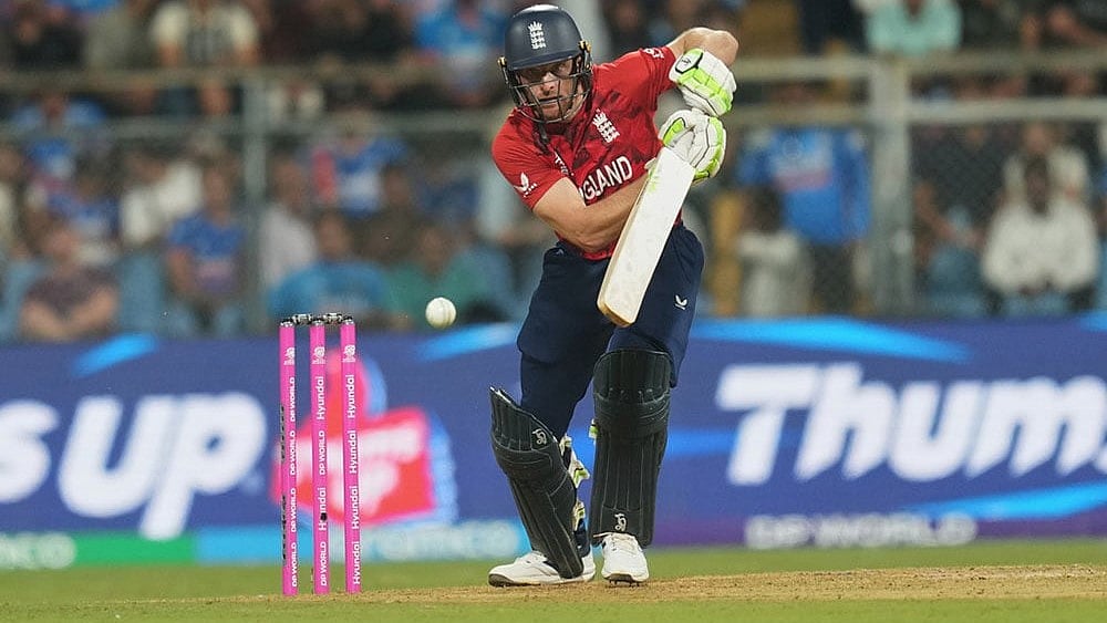 | Photo: AP/Rafiq Maqbool : Englands Jos Buttler plays a shot during the T20 World Cup cricket semi-final match between India and England in Mumbai, India.