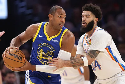 | Photo: AP/Nate Billings : Golden State Warriors center Al Horford (20) looks for an outlet against Oklahoma City Thunder guard Kenrich Williams during the first half of an NBA basketball game in Oklahoma City.