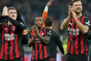 | Photo: AP/Luca Bruno : AC Milan's Pervis Estupinan, centre, celebrates after the Serie A soccer match between AC Milan and Inter Milan, in Milan, Italy.