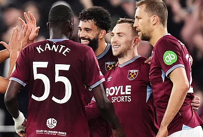 | Photo: John Walton/PA via AP : West Ham Uniteds Jarrod Bowen, second right, celebrates scoring with teammates during the English FA Cup fifth round soccer match between West Ham United and Brentford in London.