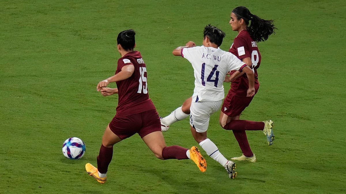 APRick Rycroft : Taiwan's Wu Kai Ching, center, takes a shot between India's Martina Thokchom, left, and India's Sanju Yadav during the Women's Asian Cup soccer match between India and Taiwan in Sydney, Monday, March 10, 2026.