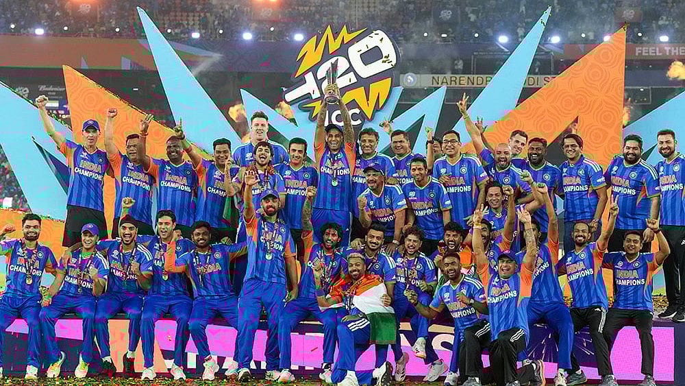 | Photo: PTI/Shailendra Bhojak : Indias captain Suryakumar Yadav lifts the tournament trophy with teammates after winning the ICC Mens T20 World Cup 2026, at Narendra Modi Stadium, in Ahmedabad, Gujarat.
