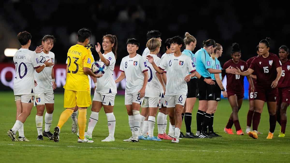 (AP Photo/Rick Rycroft) : Taiwan players celebrate after their win against India in the Women's Asian Cup soccer match in Sydney, Monday, March 10, 2026