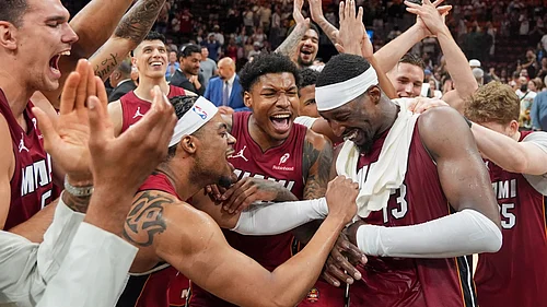 AP : Bam Adebayo (13) celebrates with his teammates after record-breaking night.