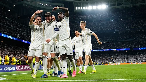 | Photo: AP/Jose Breton : Real Madrids Federico Valverde, center, celebrates after scoring his third goal during a first leg round of 16 Champions League soccer match between Real Madrid and Manchester City in Madrid, Spain, Wednesday, March 11, 2026.