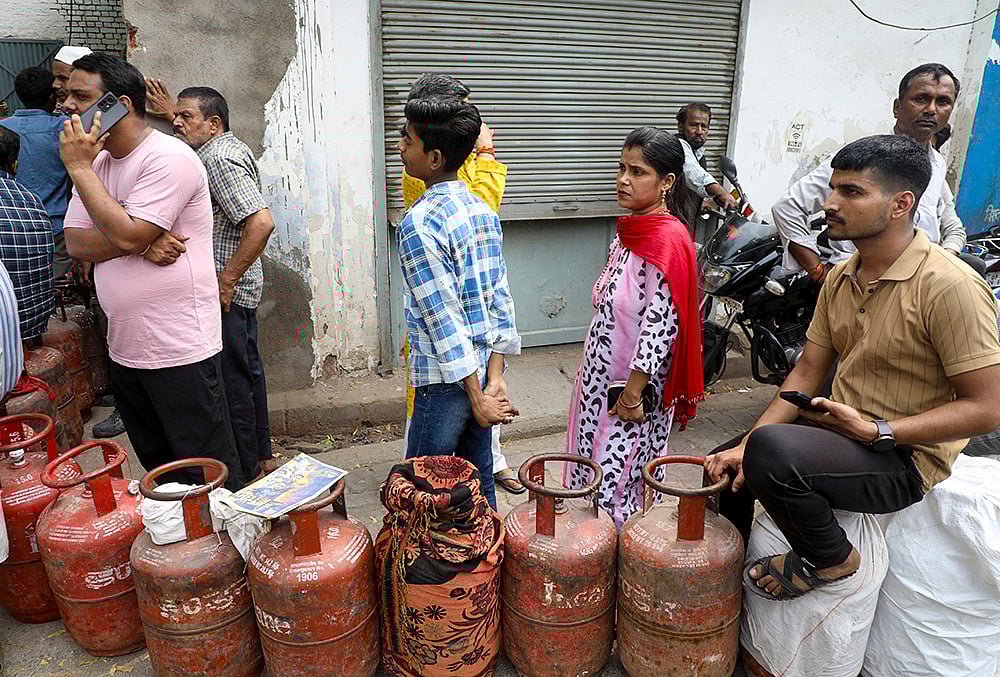 | Photo: PTI/Nand Kumar : People queue up to book LPG cylinders at an Indane gas agency in Lalbagh area of Lucknow, Tuesday, March 10, 2026. Long queues were seen at several gas agencies amid an ongoing LPG supply shortage in the country. 