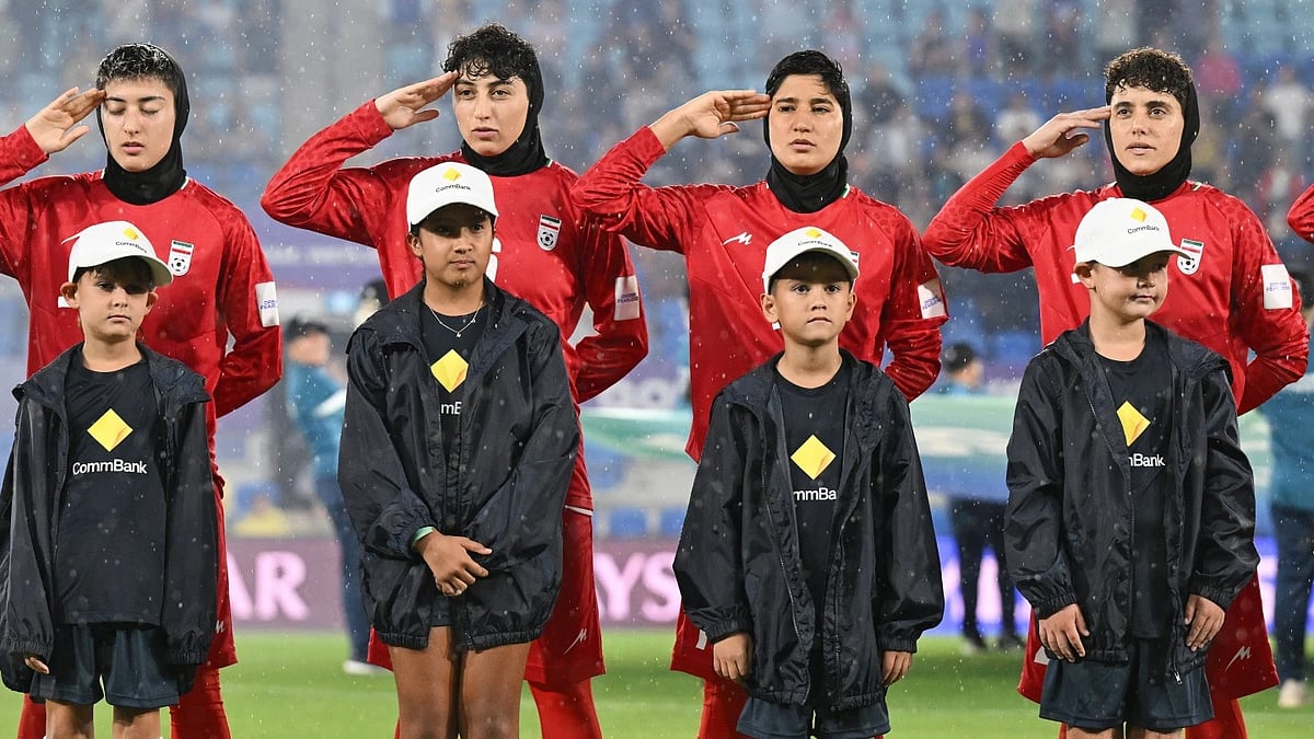 AP : Iran women's team players salute during the national anthem.