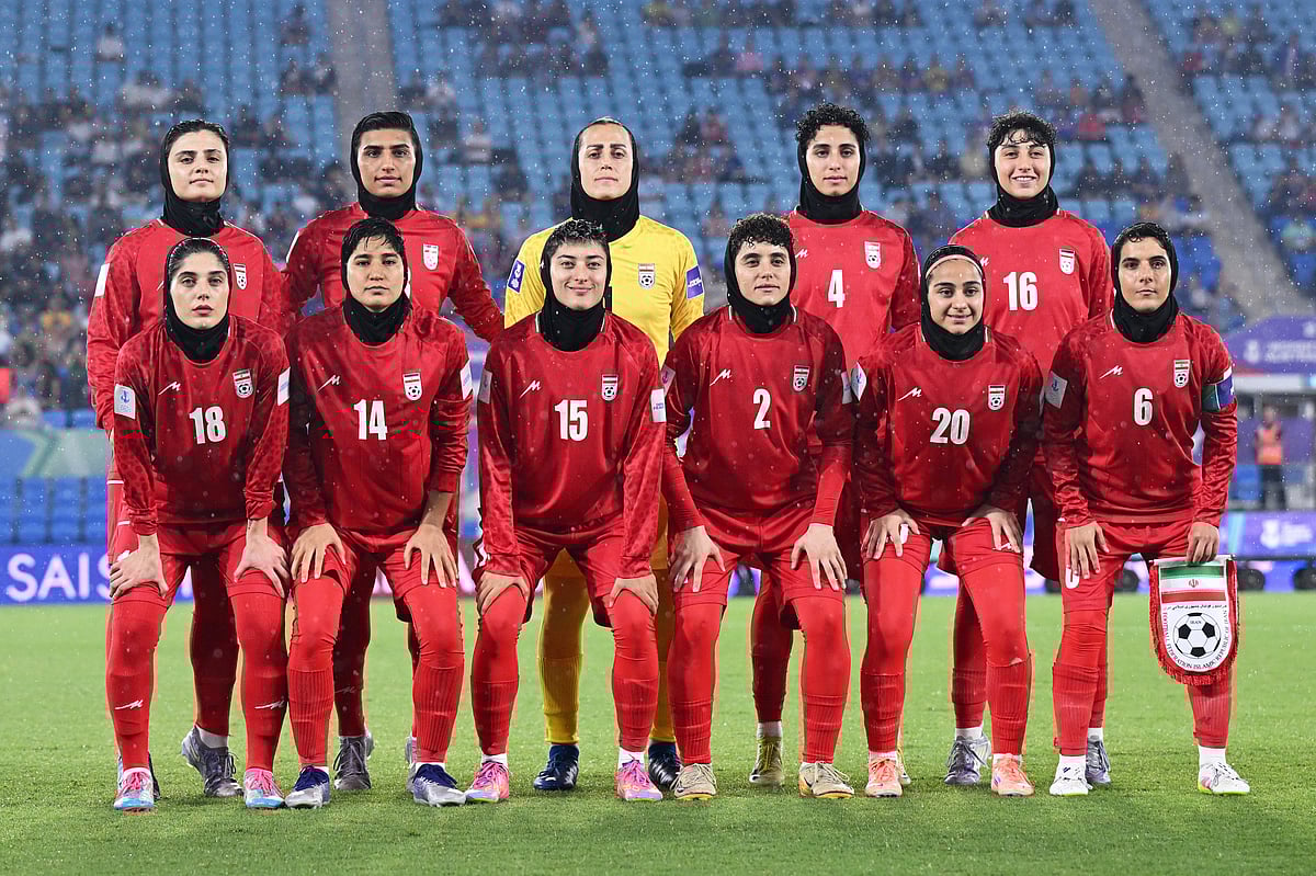 Dave Hunt/AP : Iranian players pose for a team photo ahead of the Womens Asian Cup soccer match between Iran and the Philippines in Robina, Australia, Sunday, March 8, 2026
