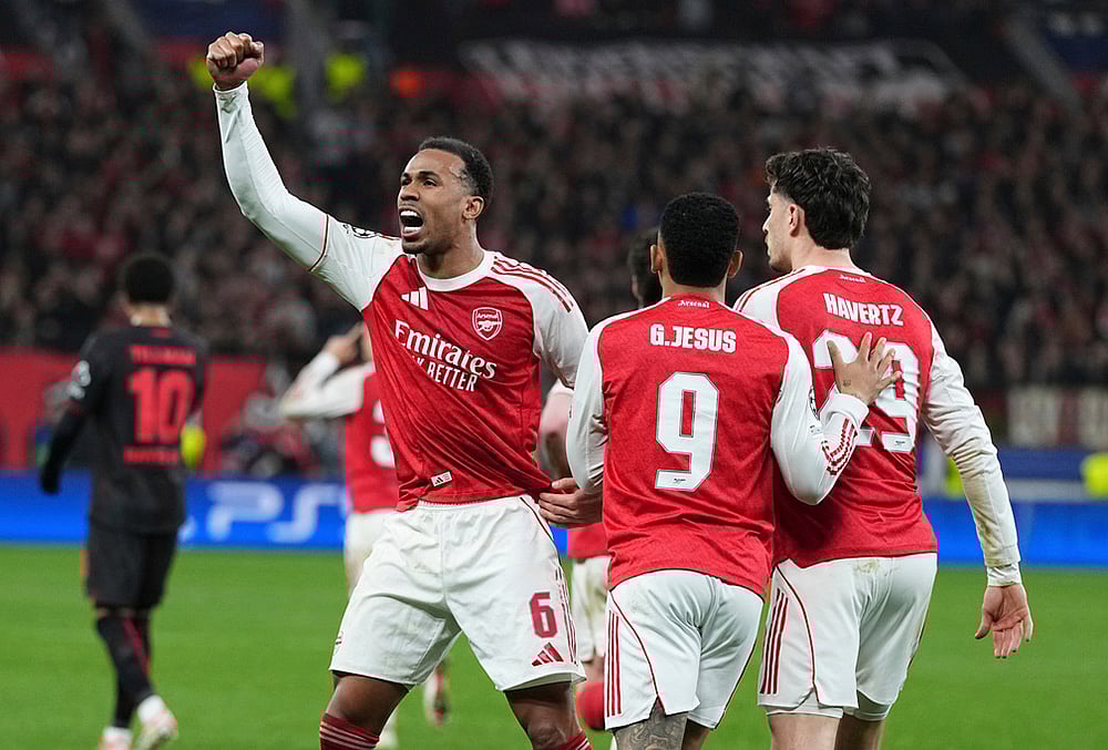| Photo: AP/Martin Meissner : Arsenals Gabriel celebrates the first goal of his team during the Champions League round of 16 first leg soccer match between Bayer Leverkusen and Arsenal FC in Leverkusen, Germany.