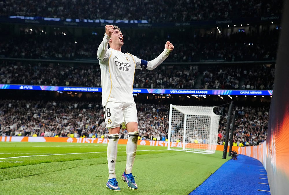 | Photo: AP/Jose Breton : Real Madrids Federico Valverde celebrates after scoring during a first leg round of 16 Champions League soccer match between Real Madrid and Manchester City in Madrid, Spain.