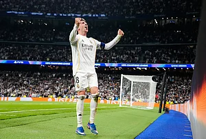 | Photo: AP/Jose Breton : Real Madrid's Federico Valverde celebrates after scoring during a first leg round of 16 Champions League soccer match between Real Madrid and Manchester City in Madrid, Spain.