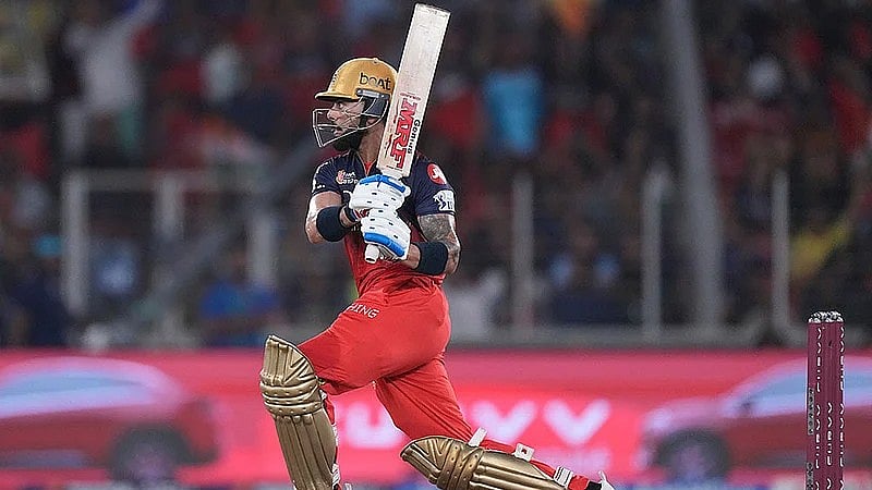 AP : Virat Kohli plays a shot during the Indian Premier League 2026 final between Punjab Kings and Royal Challengers Bengaluru at Narendra Modi Stadium in Ahmedabad.
