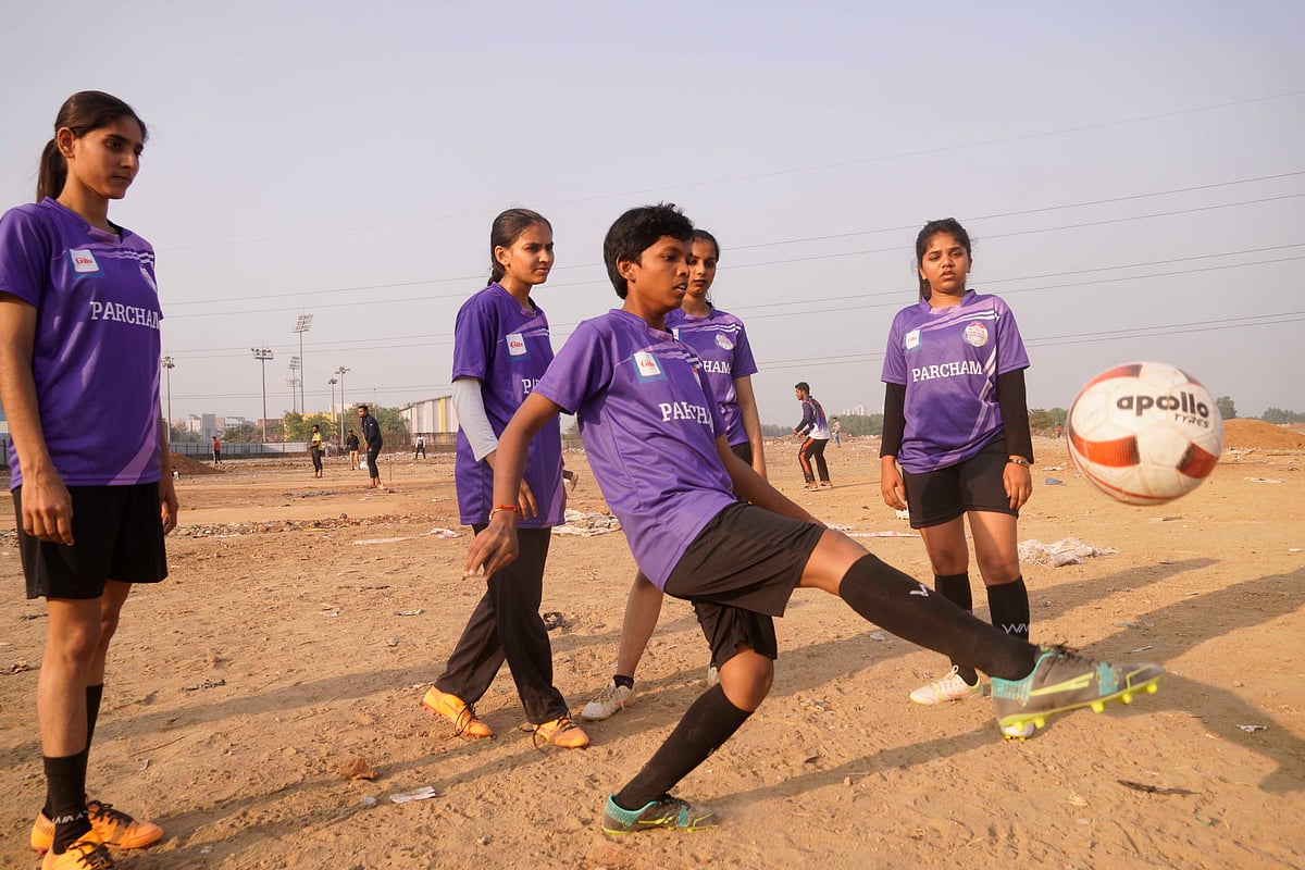 Dinesh Parab/Outlook : Women football players from Parcham football academy are practicing on Fatima Bi Savitri Bai sports ground the only womens sports ground, in Mumbra. 