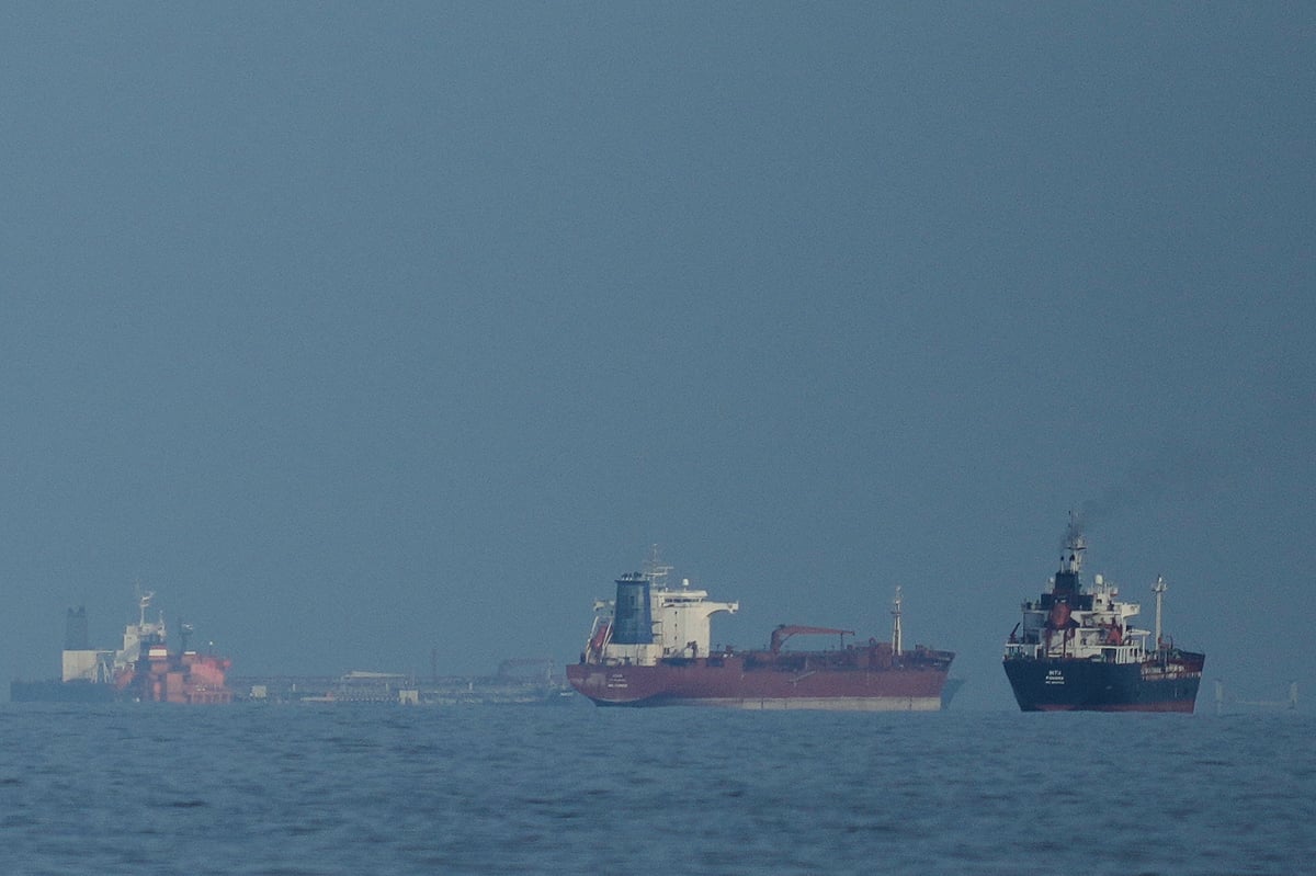 Credit: AP Photo/ Altaf Qadri | Representative Image : Oil tankers and cargo ships line up in the Strait of Hormuz as seen from Khor Fakkan, United Arab Emirates, Wednesday, March 11, 2026