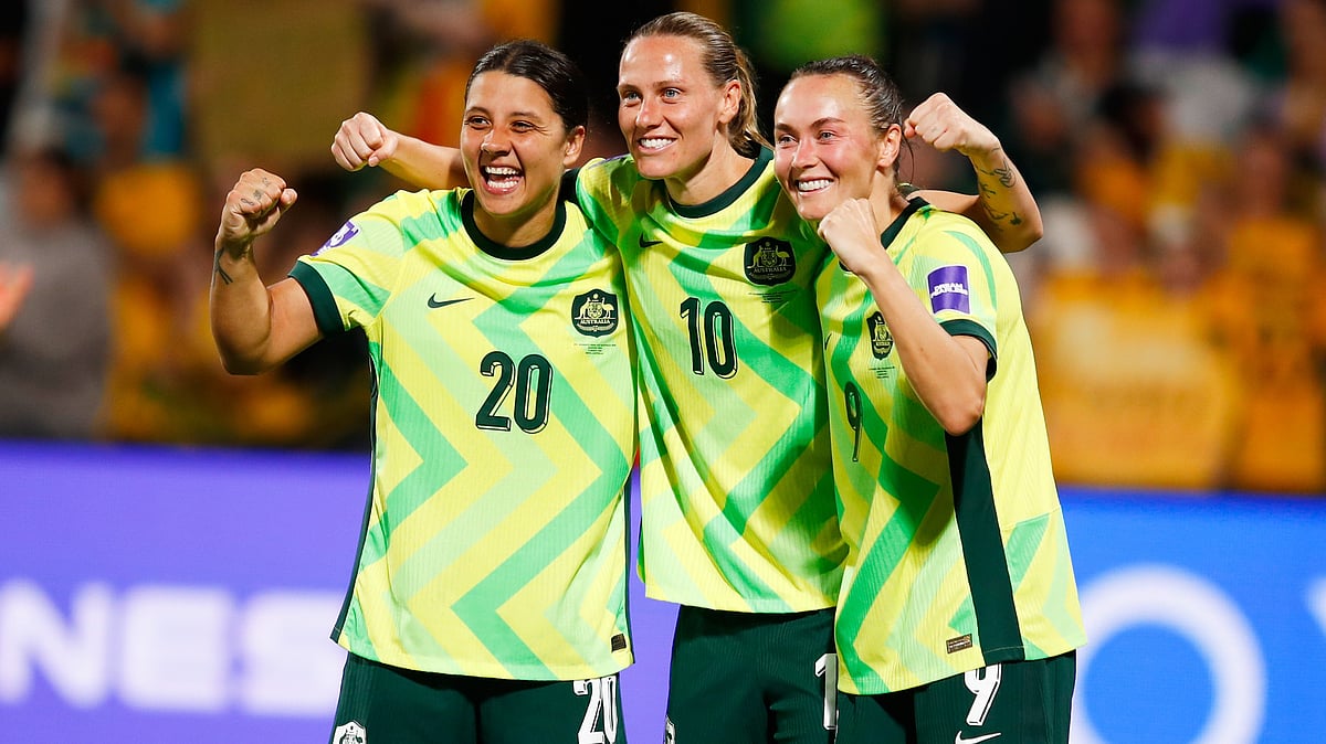 | Photo: AP/Gary Day : Australia's Sam Kerr, left, Emily van Egmond, and Caitlin Foord, right, pose for a photo as they celebrate following during the Women's Asian Cup quarterfinal soccer match between Australia and North Korea in Perth, Australia, Friday, March 13, 2026. 