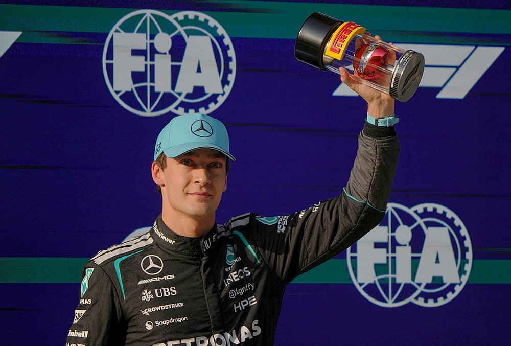 | Photo: AP/Andy Wong : Mercedes driver George Russell of Britain celebrates his pole position for the sprint qualifying ahead of the Chinese Formula One Grand Prix race in Shanghai, China.