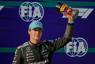 | Photo: AP/Andy Wong : Mercedes driver George Russell of Britain celebrates his pole position for the sprint qualifying ahead of the Chinese Formula One Grand Prix race in Shanghai, China.