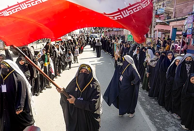 | Photo: PTI/S Irfan : People take part in a Youm-e-Quds protest demonstration expressing solidarity with Palestinians amid the ongoing West Asia conflict, in Magam, Budgam district, Jammu and Kashmir.