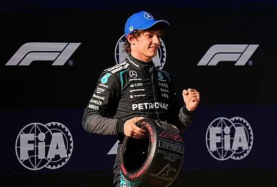 | Photo: AP/Vincent Thian : Mercedes driver Andrea Kimi Antonelli of Italy gestures after getting the pole position during the qualifying session of the Chinese Formula One Grand Prix at the Shanghai International Circuit, in Shanghai, China.