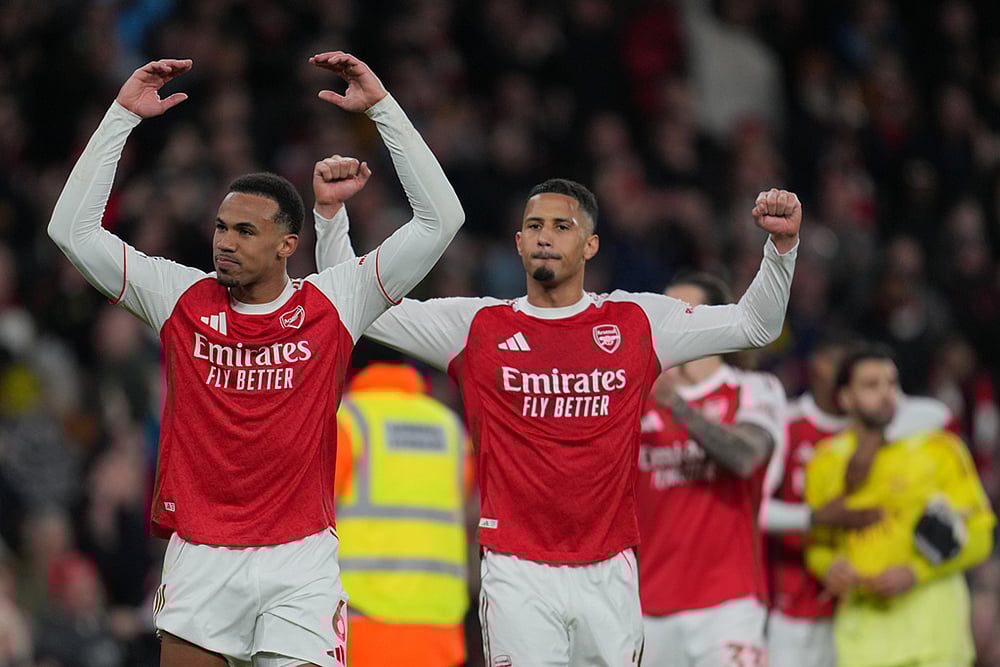 | Photo: AP/Kin Cheung : Arsenals Gabriel, left, and William Saliba celebrate after the English Premier League soccer match between Arsenal and Everton in London, England.