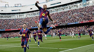 | Photo: AP/Joan Monfort : Barcelona's Raphinha celebrates after scoring his side's opening goal during the Spanish La Liga soccer match between Barcelona and Sevilla in Barcelona, Spain, Sunday, March 15, 2026.