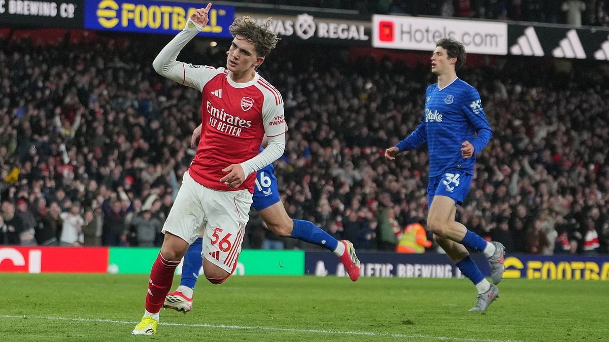 | Photo: AP/Kin Cheung : Arsenal's Max Dowman celebrates after scoring during the English Premier League soccer match between Arsenal and Everton in London, England, Saturday, March 14, 2026. 
