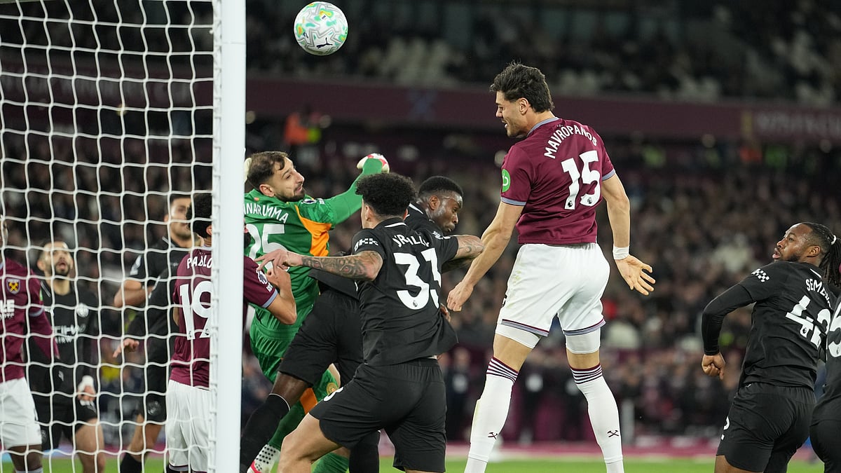 AP/Dave Shopland : Konstantinos Mavropanos (15) scores his sides first goal during the English Premier League soccer match between West Ham United and Manchester City in London.
